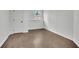 Finished basement with modern flooring, fresh paint and a nearby door for ease of access at 1430 Dallas Circle Sw, Marietta, GA 30064