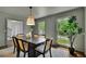 Dining room featuring a modern table, chairs, and plenty of natural light at 1430 Dallas Circle Sw, Marietta, GA 30064