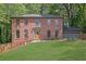 Charming brick home with a classic design, beautiful landscaping, and a welcoming entrance at 1430 Dallas Circle Sw, Marietta, GA 30064