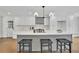 Well-lit kitchen featuring a large island, stainless appliances, and ample counter space at 1430 Dallas Circle Sw, Marietta, GA 30064