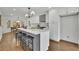 Contemporary kitchen with center island, stainless appliances, and breakfast bar seating at 1430 Dallas Circle Sw, Marietta, GA 30064