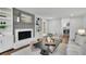 Charming living room featuring a fireplace, built-in shelving, and cozy seating at 1430 Dallas Circle Sw, Marietta, GA 30064