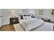 Serene main bedroom with hardwood floors, windows, and a neutral color palette at 1430 Dallas Circle Sw, Marietta, GA 30064