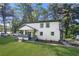 Charming two-story home with a welcoming front porch and a freshly landscaped front yard at 2111 Holly Hill Dr, Decatur, GA 30032