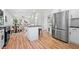 Modern kitchen with stainless steel appliances, white cabinetry, and an open layout at 2111 Holly Hill Dr, Decatur, GA 30032