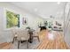 Bright and airy living room featuring hardwood floors, a large window with natural light, and elegant decor at 2111 Holly Hill Dr, Decatur, GA 30032