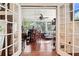Sun room with a beverage station and views of the surrounding yard at 5027 Castlewood Sw Dr, Lilburn, GA 30047