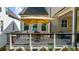 Inviting deck with outdoor seating and an umbrella, offering a relaxing space at 10140 Grandview Sq, Duluth, GA 30097