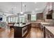 Open-concept kitchen flows into the living area, perfect for entertaining and Gathering gatherings at 10140 Grandview Sq, Duluth, GA 30097