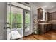 Gourmet kitchen with access to the outdoor patio, perfect for dining al fresco at 10140 Grandview Sq, Duluth, GA 30097