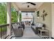 Relaxing outdoor patio with comfortable seating and view of the backyard at 10140 Grandview Sq, Duluth, GA 30097