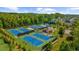 Enjoy a game of tennis at the community's well-maintained tennis courts surrounded by lush greenery at 10140 Grandview Sq, Duluth, GA 30097