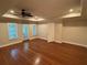 Spacious bedroom boasts hardwood floors, natural light, and a ceiling fan for added comfort at 3047 Lenox Ne Rd # 2105, Atlanta, GA 30324