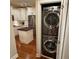 Convenient laundry closet with stacked washer and dryer near an updated kitchen at 3047 Lenox Ne Rd # 2105, Atlanta, GA 30324