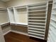 Customizable walk-in closet with lots of shelving and hanging space at 3047 Lenox Ne Rd # 2105, Atlanta, GA 30324