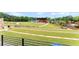 Elevated view of the grassy amphitheater with terraced seating at 727 Hammond Dr, Woodstock, GA 30188