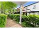 Charming neighborhood walkway showcasing the well-maintained exteriors and landscaping at 727 Hammond Dr, Woodstock, GA 30188
