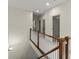 Upstairs hallway with hardwood banister at 727 Hammond Dr, Woodstock, GA 30188