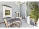 Lovely deck featuring outdoor seating, white railings and back door entryway at 8640 Amsbury Way, Cumming, GA 30041