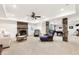 Entertainment space with cozy seating, stone accents, and a pool table at 8640 Amsbury Way, Cumming, GA 30041