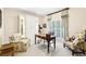 Charming office space with built-in cabinets and window seating area, ideal for work or relaxation at 8640 Amsbury Way, Cumming, GA 30041