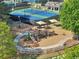 Features include a playground, swings, and tennis courts, offering residents recreational activities and outdoor enjoyment at 8640 Amsbury Way, Cumming, GA 30041
