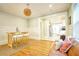 Open-concept dining room featuring stylish lighting and seating at 98 Chappell Nw Rd, Atlanta, GA 30314