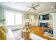 Bright living room with a ceiling fan and freshly painted walls at 98 Chappell Nw Rd, Atlanta, GA 30314
