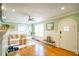 Cozy living room with hardwood floors and abundant natural light at 98 Chappell Nw Rd, Atlanta, GA 30314