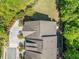 A high-angle view showcasing the home's roof, landscaping, and surrounding greenery at 2166 Sonoma Se Dr, Smyrna, GA 30080