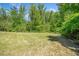 Expansive backyard offers ample space for outdoor activities and enjoying the natural surroundings at 2166 Sonoma Se Dr, Smyrna, GA 30080