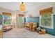 Bright Bedroom with a crib, natural light, and warm decor at 2166 Sonoma Se Dr, Smyrna, GA 30080