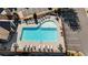 Aerial view of the community pool with ample seating, parking, and a lounge area at 2166 Sonoma Se Dr, Smyrna, GA 30080