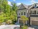 Charming two-story home with manicured landscaping, offers curb appeal and convenience with a spacious two-car garage at 2166 Sonoma Se Dr, Smyrna, GA 30080