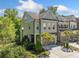 Beautiful townhome with lush landscaping, two car garage, and well-maintained exterior at 2166 Sonoma Se Dr, Smyrna, GA 30080