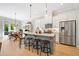 Stylish kitchen with stainless steel appliances, a center island, and a dining area, perfect for both cooking and entertaining at 2166 Sonoma Se Dr, Smyrna, GA 30080