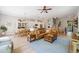 Open living space with wood floors, a dining area, a kitchen, and a staircase at 2166 Sonoma Se Dr, Smyrna, GA 30080