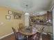 Cozy breakfast nook adjacent to kitchen, perfect for casual dining at 2775 Storybook Ct, Grayson, GA 30017