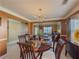 Elegant dining room featuring a chandelier and seamless access to the living area at 2775 Storybook Ct, Grayson, GA 30017
