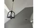 Close-up of modern chandelier hanging from high ceilings at 280 Ridge Bluff Ln, Suwanee, GA 30024