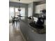 Bright eat-in kitchen with granite countertops and stainless steel appliances at 280 Ridge Bluff Ln, Suwanee, GA 30024
