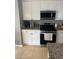 Well-equipped kitchen with stainless steel appliances and granite countertops at 280 Ridge Bluff Ln, Suwanee, GA 30024