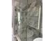 Bathroom with a glass enclosed walk-in shower, gray marble tiles, and mosaic flooring at 280 Ridge Bluff Ln, Suwanee, GA 30024