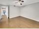 Bedroom features hardwood floors and a walk out to a covered patio at 4254 River Green Nw Dr # 612, Atlanta, GA 30327