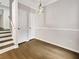 Bright dining room with hardwood flooring and a modern chandelier at 4254 River Green Nw Dr # 612, Atlanta, GA 30327