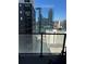 Stunning urban view from the private balcony of a condo, overlooking city buildings at 1280 W Peachtree Nw St # 2801, Atlanta, GA 30309