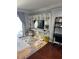 Cozy living room boasts a stylish entertainment center with shelves, a comfortable sofa, and modern decor at 1280 W Peachtree Nw St # 2801, Atlanta, GA 30309