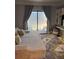 Comfortable living room features a large sofa, a sliding glass door, and a modern entertainment setup at 1280 W Peachtree Nw St # 2801, Atlanta, GA 30309