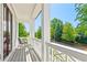 Relaxing balcony with green views at 130 Inwood Walk, Woodstock, GA 30188