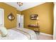 Cozy bedroom with painted walls, plush carpet, and a mounted television at 130 Inwood Walk, Woodstock, GA 30188